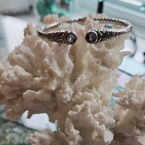 Elegant Sterling Silver Bracelet with Intricate Design & 2 Blue Topaz Stones